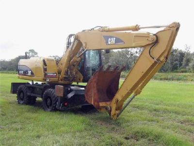 колесный экскаватор CAT M318 2004 г.в.
