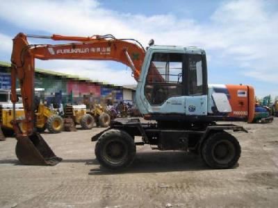 колесный экскаватор Hitachi FX100WD 1996 г.в.