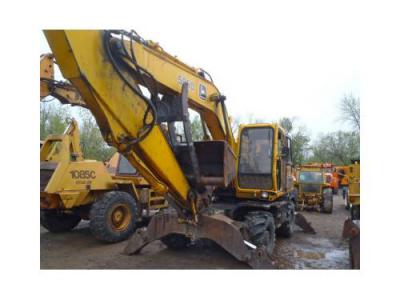 колесный экскаватор JOHN DEERE 595D 1992 г.в.