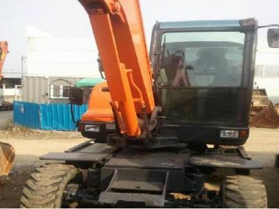 колесный экскаватор Doosan DX55WA 2010 г.в.