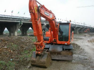 колесный экскаватор Doosan  DX140WA 2010 г.в.