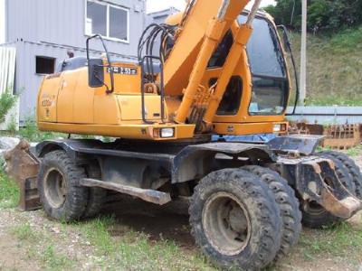 колесный экскаватор Hyundai ROBEX1300WM 2003 г.в.