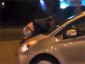 23.07.2014 - Во Владивостоке женщина с мужем на капоте попала в ДТП